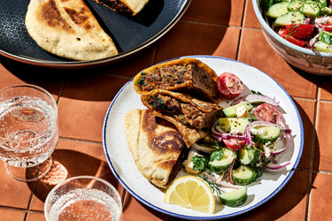 Lamb & Feta Stuffed Pitas with Creamy Tomato-Cucumber Salad